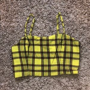 Yellow spaghetti strap crop top.